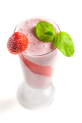 Sweet and fresh strawberry smoothies on white background