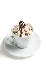 Small coffee with whipped cream and chocolate