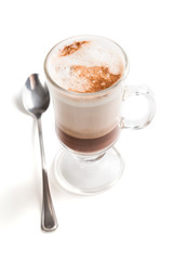 Closeup of big coffee latte on a white background