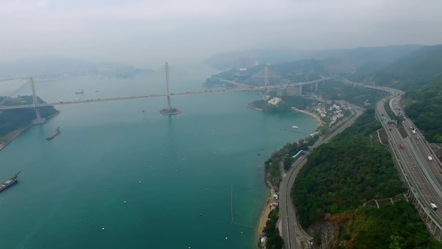 Tsing Long Hwy. Beautiful view from the aeral shot by drone. Fog, haze, smog, clouds.