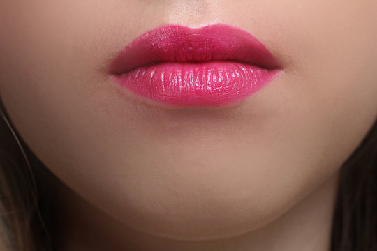 Pink make-up of lips close-up