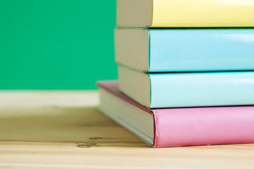 books on a wooden desk