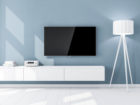 Smart Tv Mockup With Blank Screen Hanging On The Blue Wall, Living Room. 3d Rendering