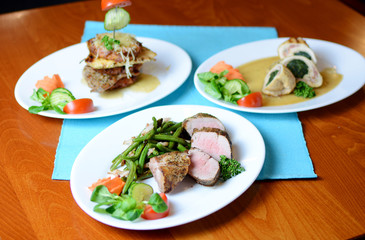 Steak with herbs on a plate in the pub.
