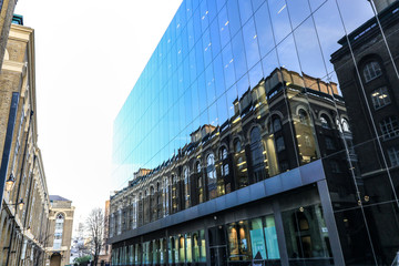 Naklejka premium Reflections of houses in office