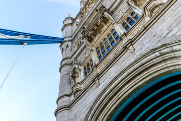 Close up of the Tower Bridge standing underneath one of the entrances