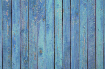blue old wooden fence. wood palisade background. planks texture