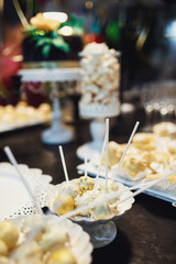 Little bowls with cakes and other sweets