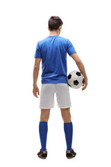 Rear view shot of a teenage football player © Ljupco Smokovski