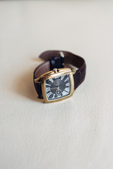 The wedding watch for groom  stands on the table