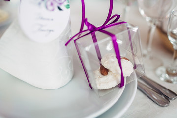The napkin and cake standing on the plate