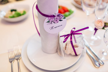 The napkin and cake standing on the plate