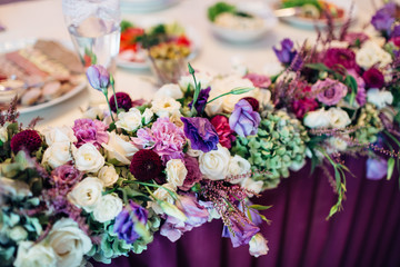 The flowers are on the wedding table