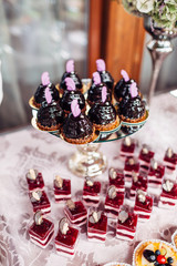 The different desserts standing on the banquet table