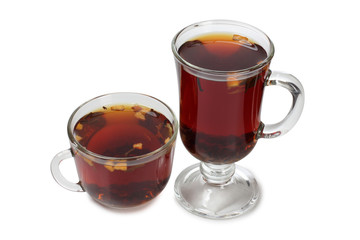 Glass cup with tea on white background