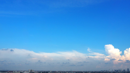 Blue sky and white clouds and landscape of city.