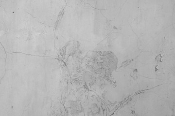Wall fragment with scratches and cracks