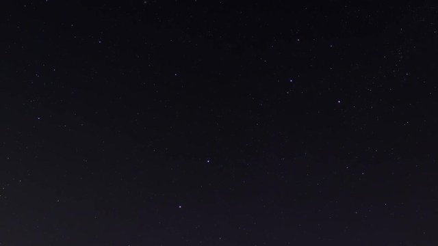 Timelapse of stars moving in night sky. 4K time lapse.