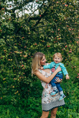 Fototapeta premium Mother with her son on a walk