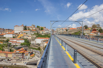 Fototapeta premium Tracks on top of the Ponte Luis I in Porto