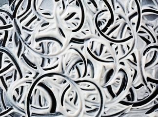 Structural plaster white on a black background. White Cream. paint smear.