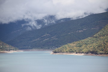 Obraz premium Fog in the mountains/ Foggy lake shore in the mountains, Georgia