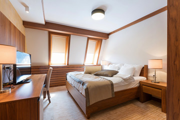 Fototapeta na wymiar Hotel apartment, bedroom interior in the morning