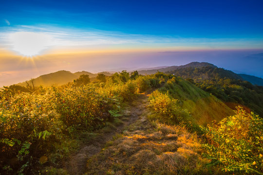 View from the highest mountain peak of Doi Pha Hom Pok with beautiful cloudy sunset twilight sky, Chiang mai, Thailand