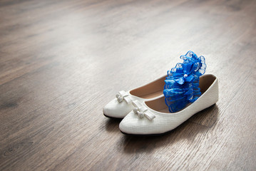 White shoes and the bride's garter