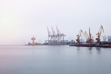 Fototapeta na wymiar Cargo crane sea port