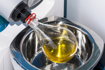 Medical flask in a mixing machine.