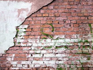 brick wall with peeling plaster, putty texture old background
