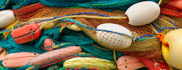 Fototapeta premium background of colorful fishing nets and floats