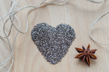 Chia seeds on wooden cutting board