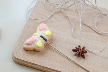 Sweet oatmeal cookies on wooden board