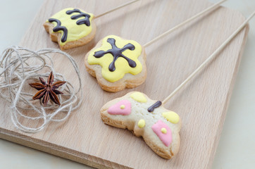 Sweet oatmeal cookies on wooden board