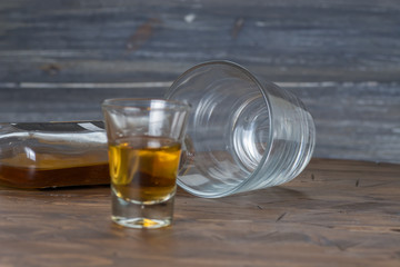a stack of alcohol on wooden