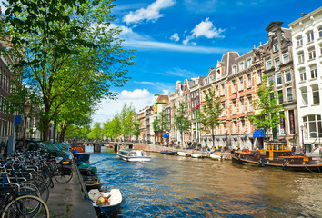Amsterdam canals and typical houses with clear summer sky © Alexander Demyanenko