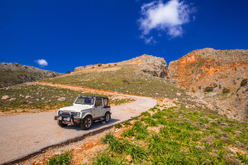 Fototapeta na wymiar Twisted mountain road to the Seitan limania beach on Crete, Greece