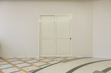 sidewalk by street wall & door