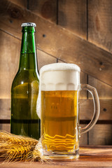 Glass of beer and beer bottle