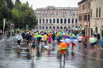 Athletes run the marathon in the city, in Rome
