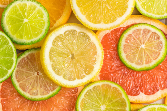 Grapefruit, lime, lemon, and orange slices background