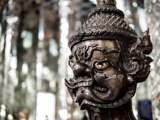 Head of giant thailand with white Bokeh is background in temple,Thailand
