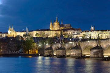 Naklejka premium Prague night. Vltava river, old castle and Charles Bridge