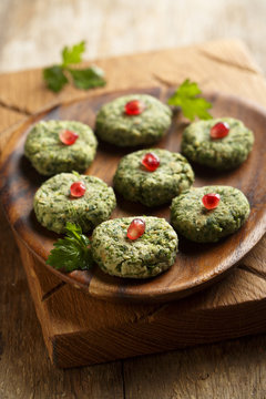 Spinach appetizer with pomegranate seeds