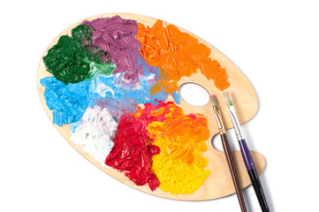 Artist's color palette with multi-colored oil paints