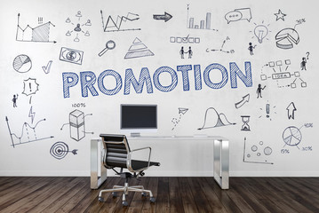 PROMOTION | Desk in an office with symbols
