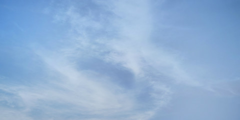 Naklejka na ściany i meble Blue sky background with sunny and clouds 