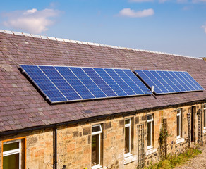 Fototapeta premium A roof mounted solar panel system